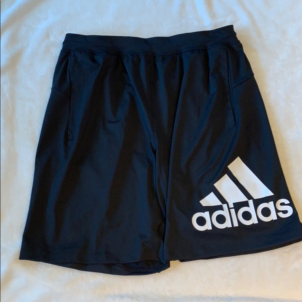Brand new black adidas athletic shorts.